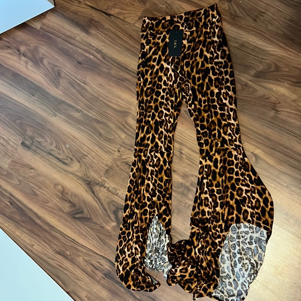 NEVER WORN!! Cheetah tight flare pants